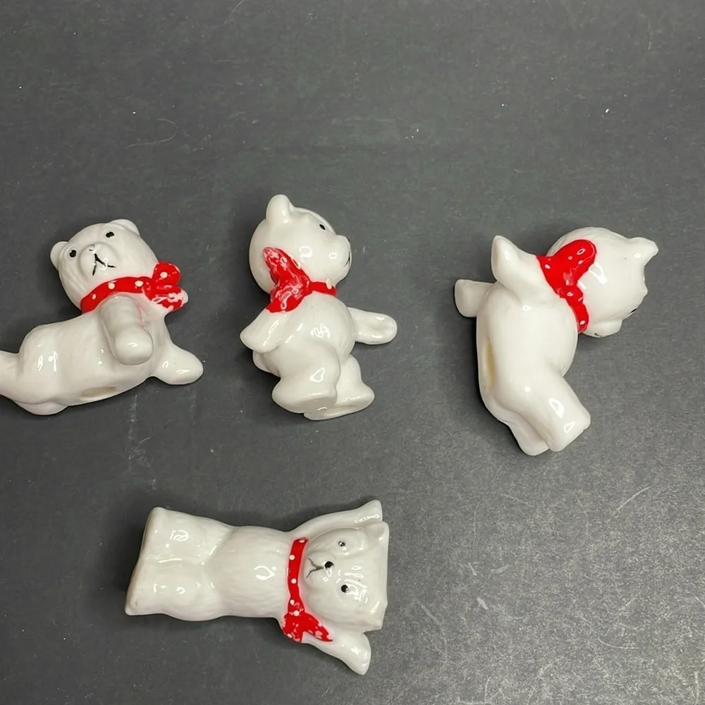 Set‎ of (4) Porcelain/china Posing Polar Bears with Red Bows
